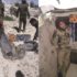 бойцы ВС САР демонстрируют убитых джихадистов