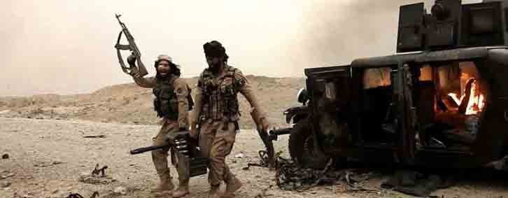 Боевики празднуют уничтожение иракской бронетехники