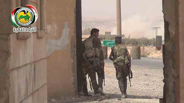 Бойцы партийного ополчения после отражения атаки ИГИЛ на г. Аль-Табани